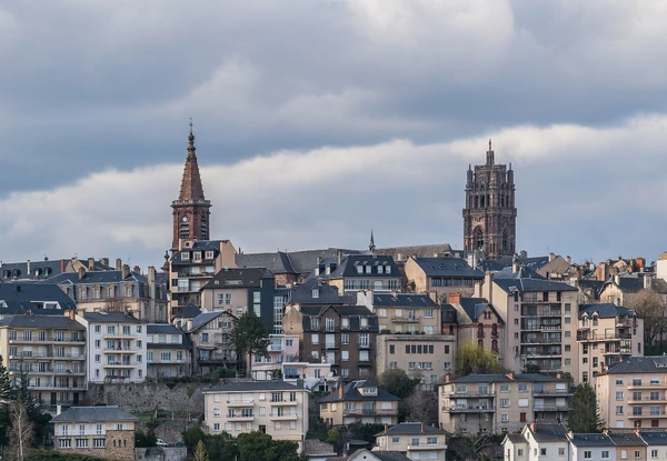 Photographie réaliste d'un paysage urbain ou architectural caractéristique de Rodez (Aveyron) - par exemple la cathédrale ou une vue du centre-ville avec ses bâtiments historiques typiques - montrant le contexte géographique et urbain de cette zone de livraison. L'image doit être une photographie authentique de la ville, de jour, claire et professionnelle, sans texte ni logo visible.